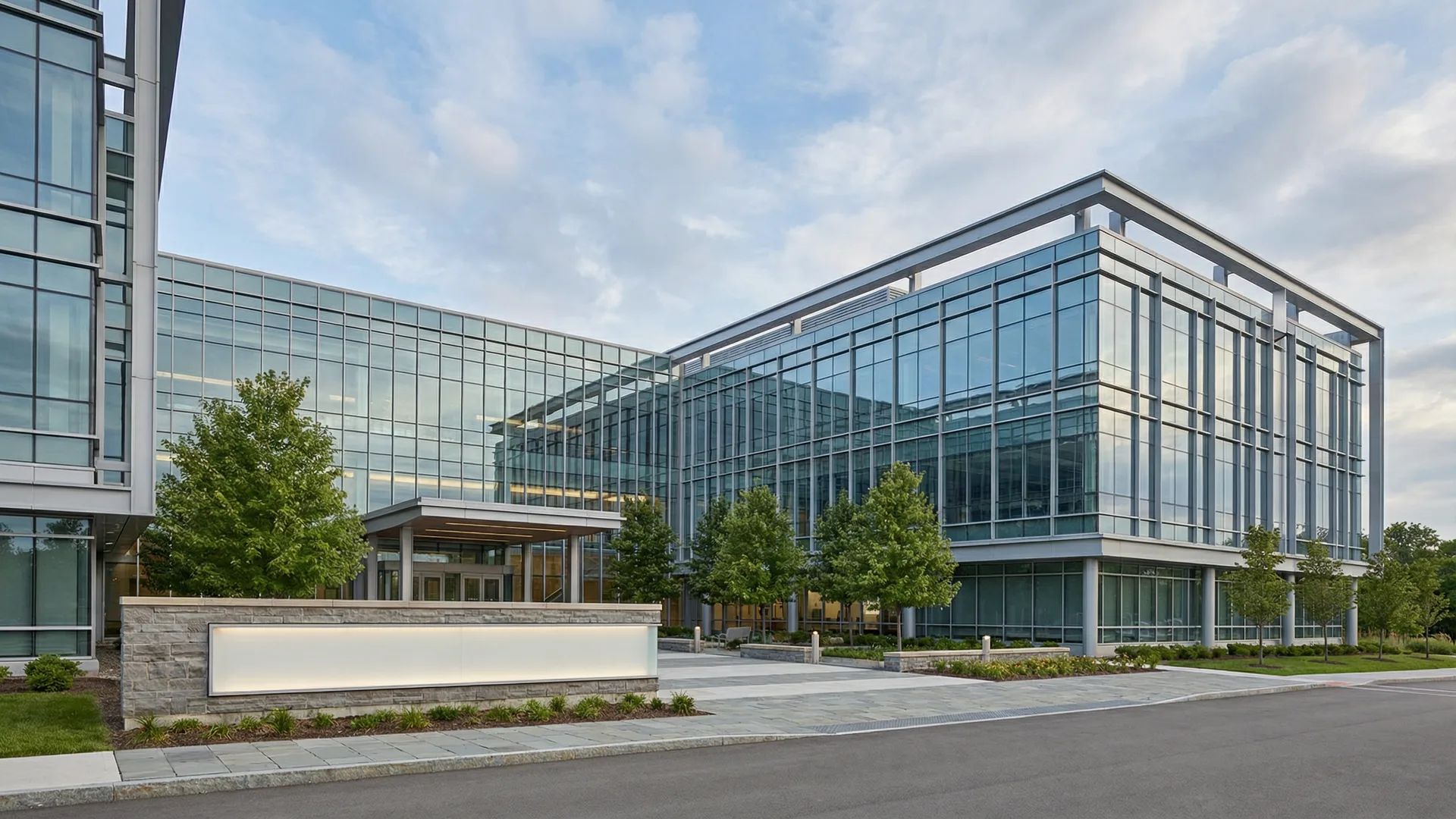 V2 Clean Corporate theme preview — modern campus building exterior